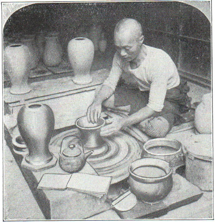 Japanese potter working at a wheel